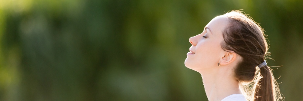 The Inhale - Receiving breath - life - woman breathes in nature - Shutterstock