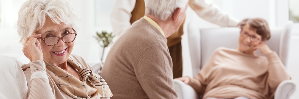 Mindfulness and Aging - embrace the present with contentment - happy elderly woman with friends