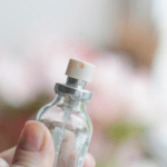 detail of a glass aromatherapy misting bottle