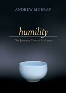 the cover of the book Humility, by Andrew Murray - a white bowl of water placed on the floor