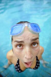 forest bathing is not swimming in a pool while making a silly face like this lady