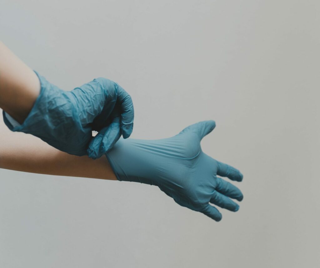 Get Ready to Clean Green - put on those blue rubber gloves - Photo by Clay Banks - Unsplash