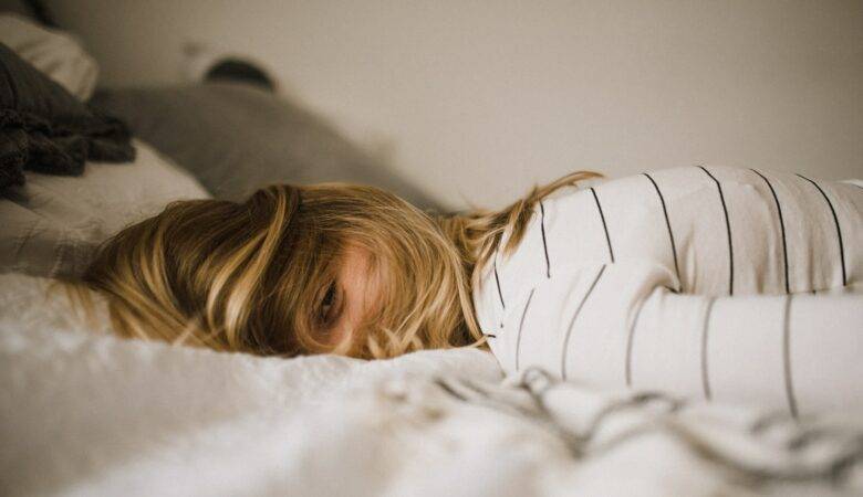 Reasons Why I Can't Sleep - Woman with Insomnia - Photo Credit - Kinga Cichewicz - Unsplash