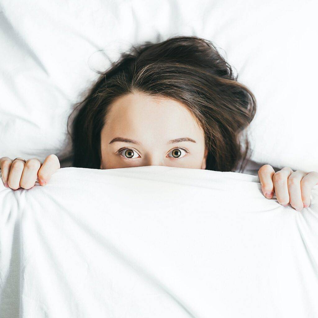 Young Woman Wide Awake - Insomnia - Photo by Alexandra Gorn - Unsplash