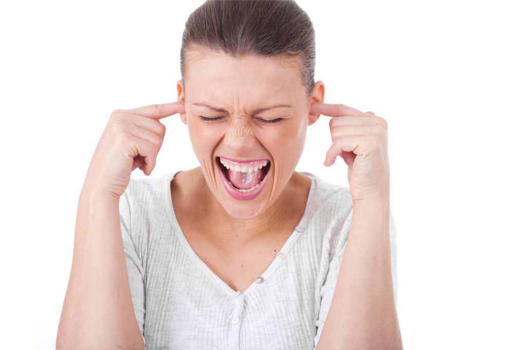 Life is Too Noisy - girl plugs ears in front of white background