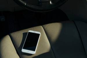 Cellphone Dropped in the Car Back Seat -- where it should be -- photo credit Shutterstock