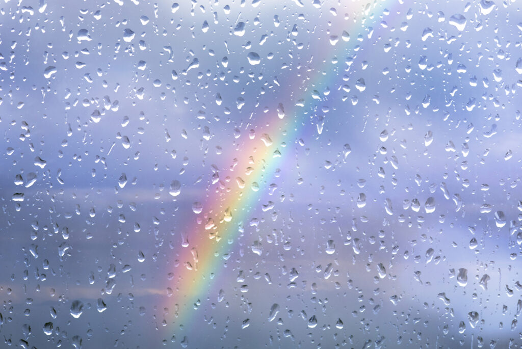 Rainbow Through a Rainy Window - After Storm - Hope - credit iStock