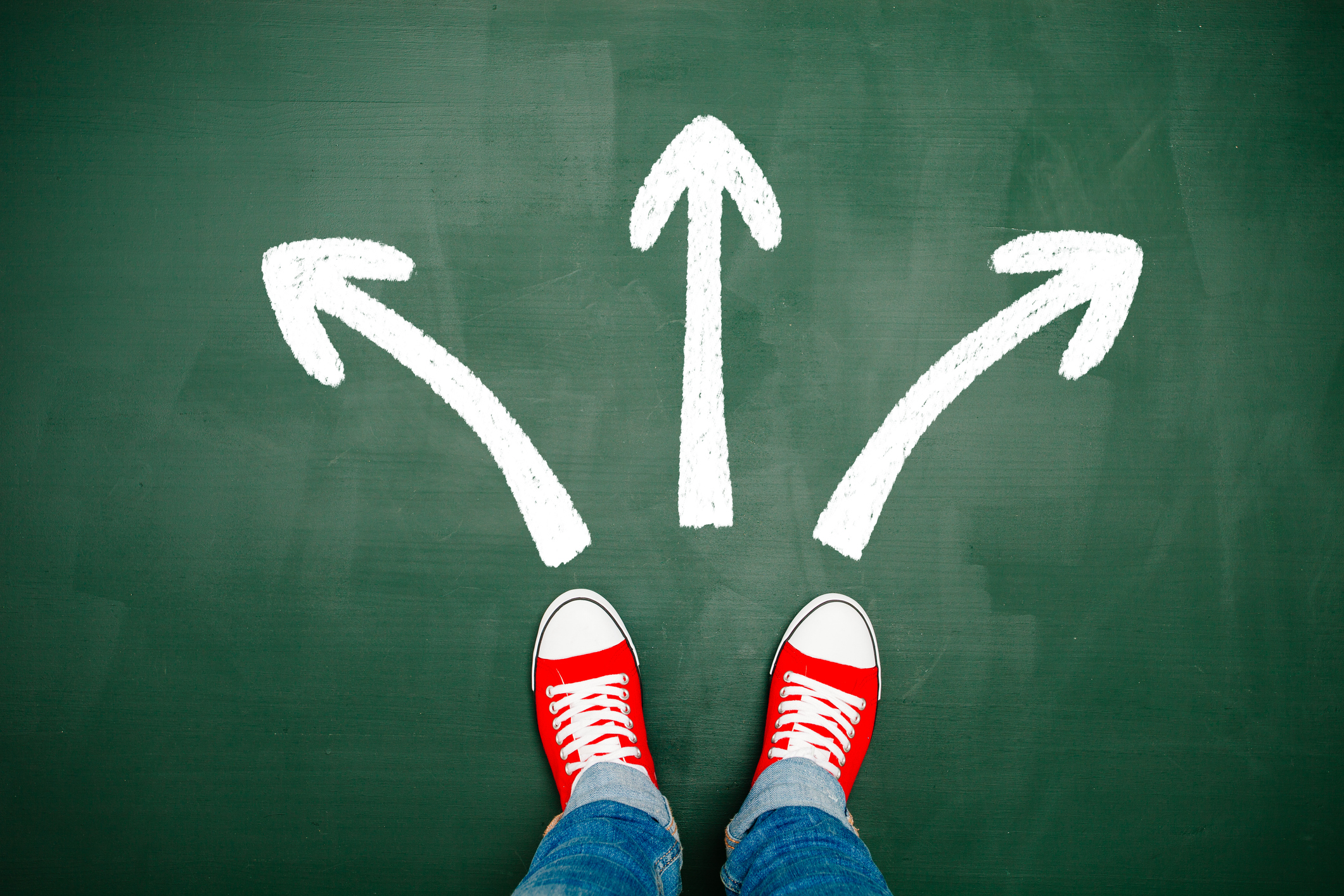 A-Mans-Feet-Making-Choices-Arrows-iStock-537349008